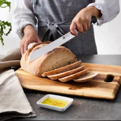 Zwilling Vier Sterne Brotmesser 23 cm schwarz